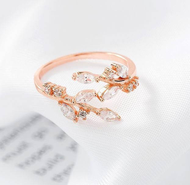 Diamond cut gold leafy ring