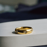 Round Emerald Flush Ring